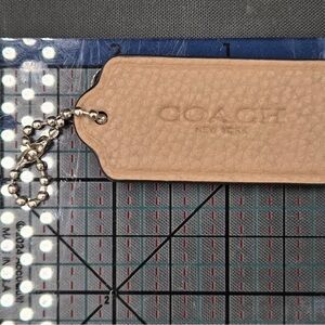 Coach Tan Leather Tag